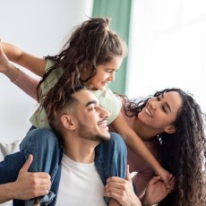 cheerful middle eastern family three having 1936256839 (1)