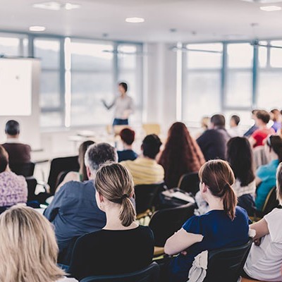 business entrepreneurship symposium speaker giving talk 1908799612